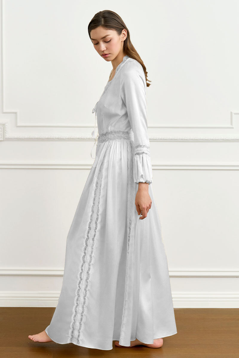 Woman wearing a grey silk robe from the MANITO Court Women's Silk Robes collection, showcasing elegant, smooth fabric and relaxed fit.
