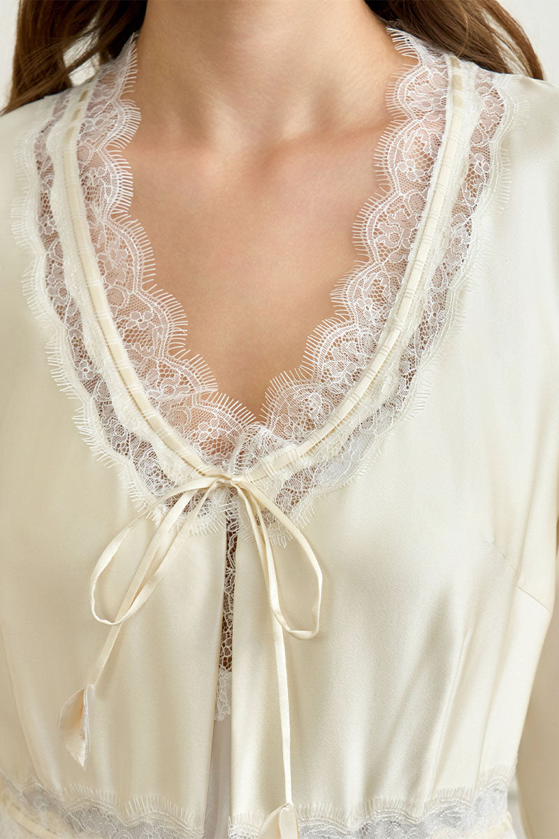 Yellow silk women’s robe by MANITO, featuring a smooth, elegant design perfect for lounging or sleepwear.