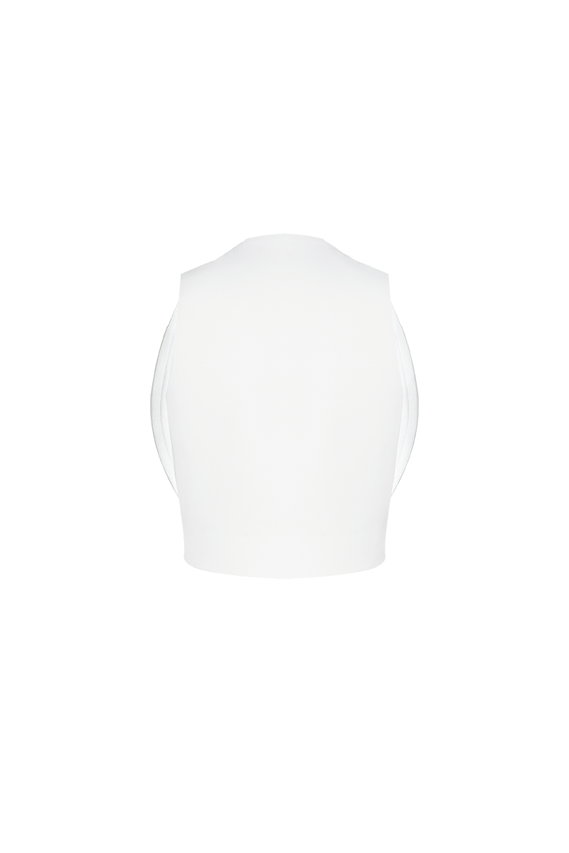 Ivory Cova crop top by ANA + MARIA, featuring a fitted design and soft fabric, shown on a model in a studio setting.