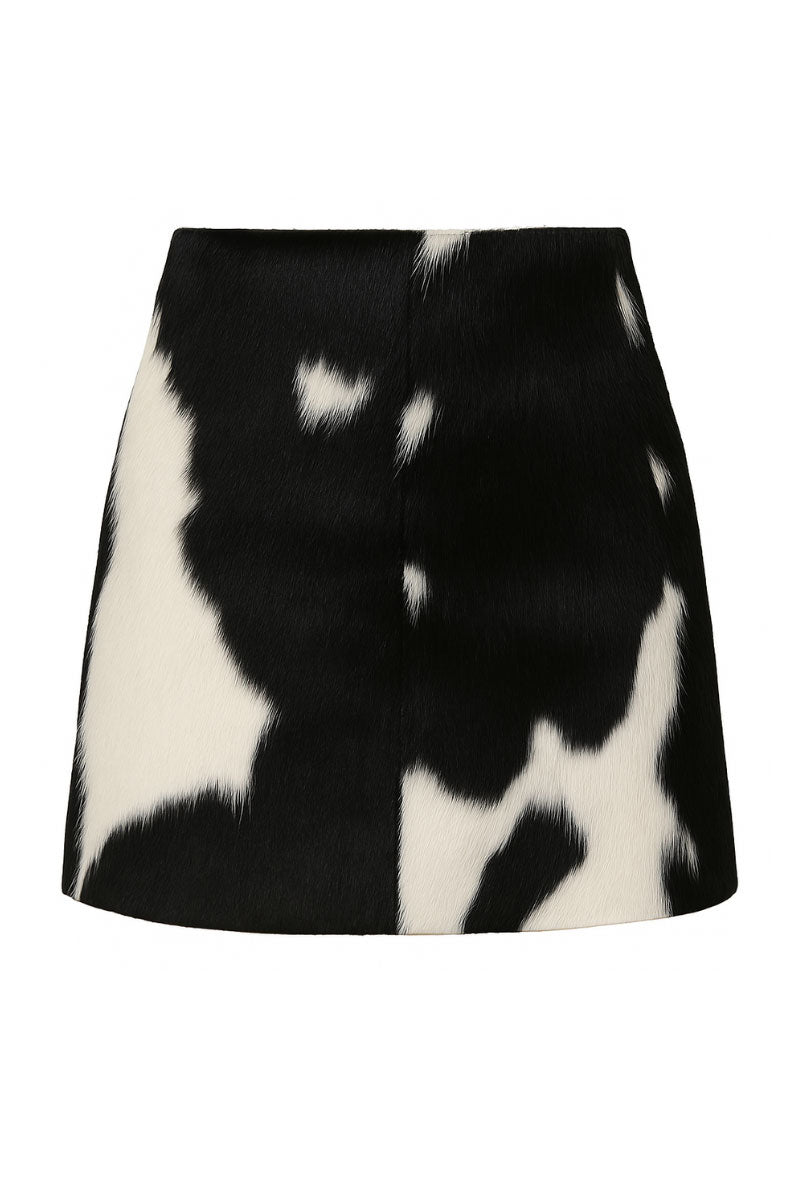 Black and white cowhide mini skirt by ZUT, featuring a sleek, fashionable design with a fitted waist and stylish pattern.