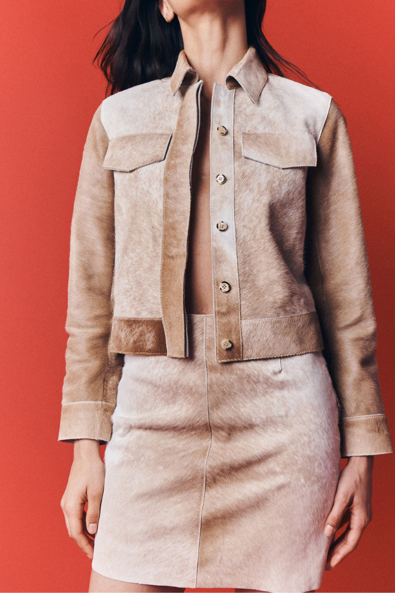 ZUT toffee cowhide mini skirt featuring a fitted silhouette and stylish design, perfect for casual or dressy outfits.