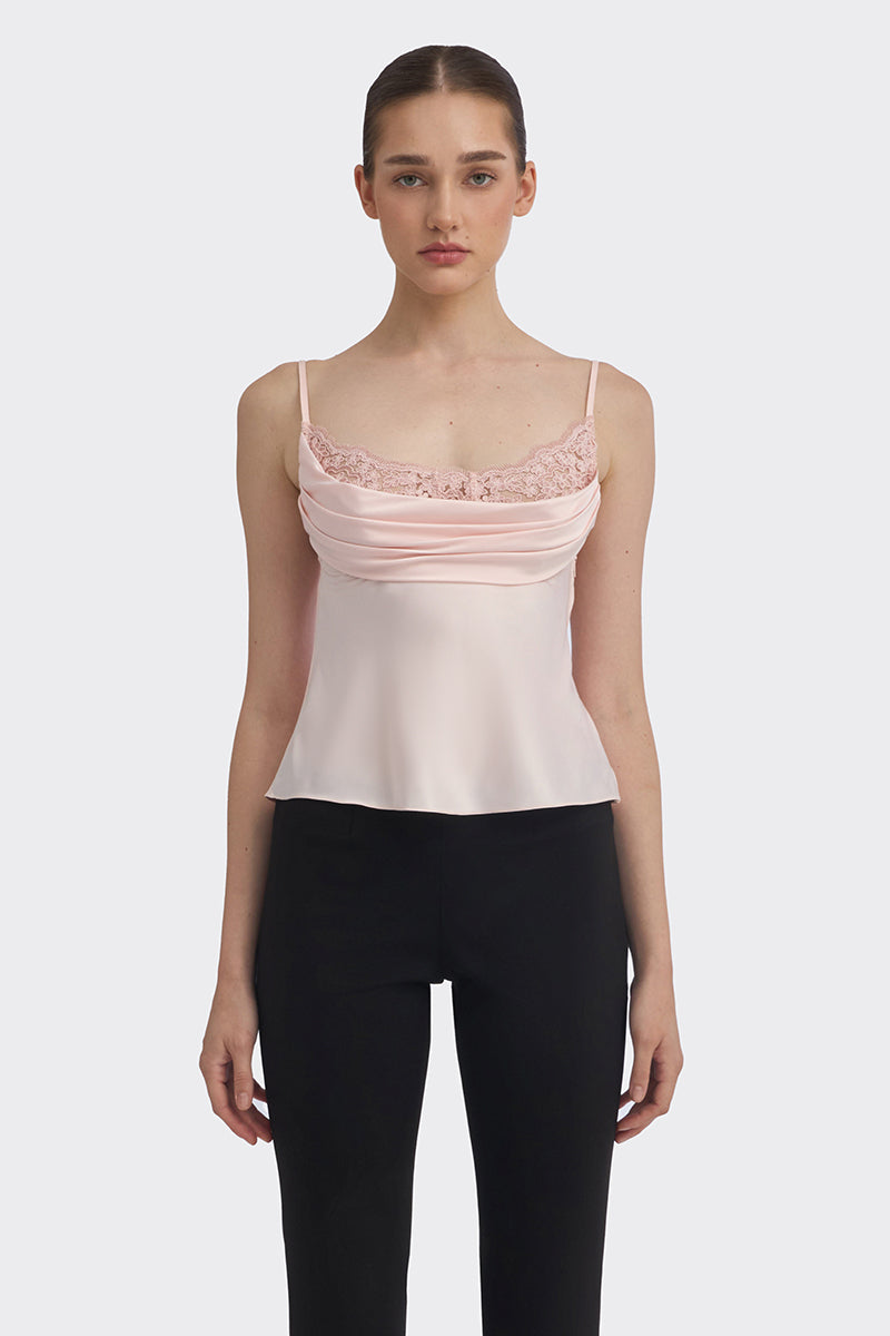 Light pink cowl neck lace top by Stolen Stores, shown on a model, featuring a stylish draped neckline and delicate lace details.