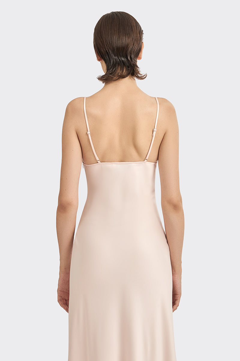 Light pink cowl neck lace midi dress by Stolen Stores, featuring a flowing silhouette and elegant design.
