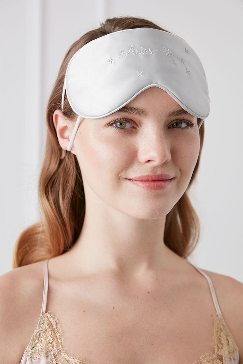 Gray Cozy Stellar Aries eye mask by MANITO, soft fabric with star pattern, designed for comfortable sleep and relaxation.