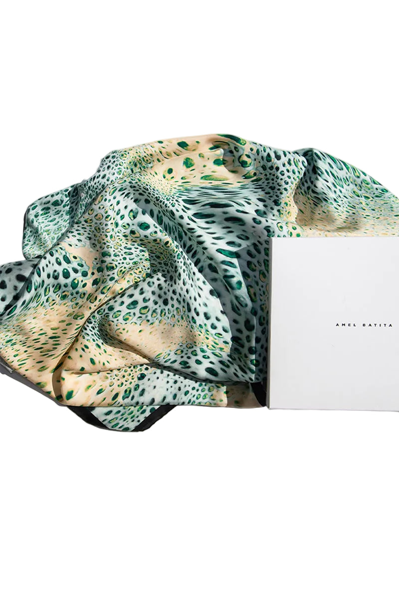 Creamy Moussard silk scarf by Amel Batita, featuring soft, luxurious fabric with elegant draping and intricate design details.