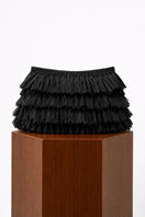 Black crochet raffia clutch bag by Folklore The Label with intricate crochet detailing and a compact, stylish design.