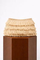 Ivory crochet raffia clutch bag by Folklore The Label, showcasing a handcrafted, textured woven design perfect for stylish accessories.