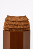 Natural crochet raffia clutch bag by Folklore The Label, featuring a woven design and compact style for casual or beach outings.
