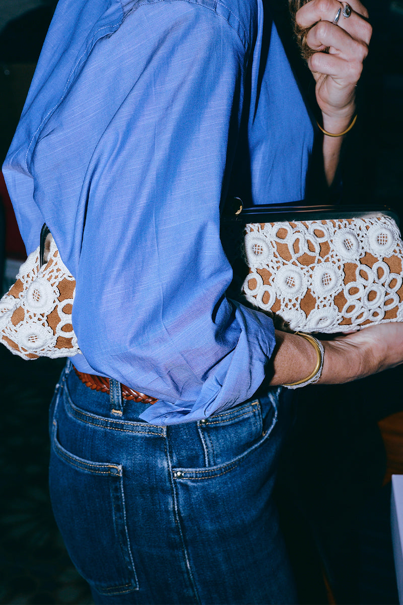 Sarah's Bag crochet Havane long clutch with intricate crochet design and spacious interior, suitable for evening or casual occasions.