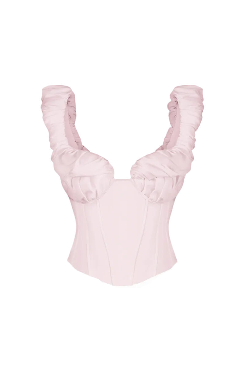 Pink croissant-style corset bustier top by Stolen Stores, featuring fitted design and stylish details.