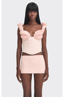 Pink croissant-shaped corset bustier top by Stolen Stores, featuring a stylish and structured design perfect for fashionable outfits.