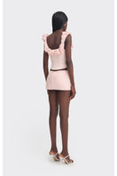 Pink croissant-shaped bustier top by Stolen Stores, stylish corset design with structured fit and feminine detailing.