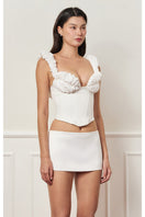 Off-white croissant corset bustier top by Stolen Stores, featuring structured design and stylish details, ideal for fashionable outfits.