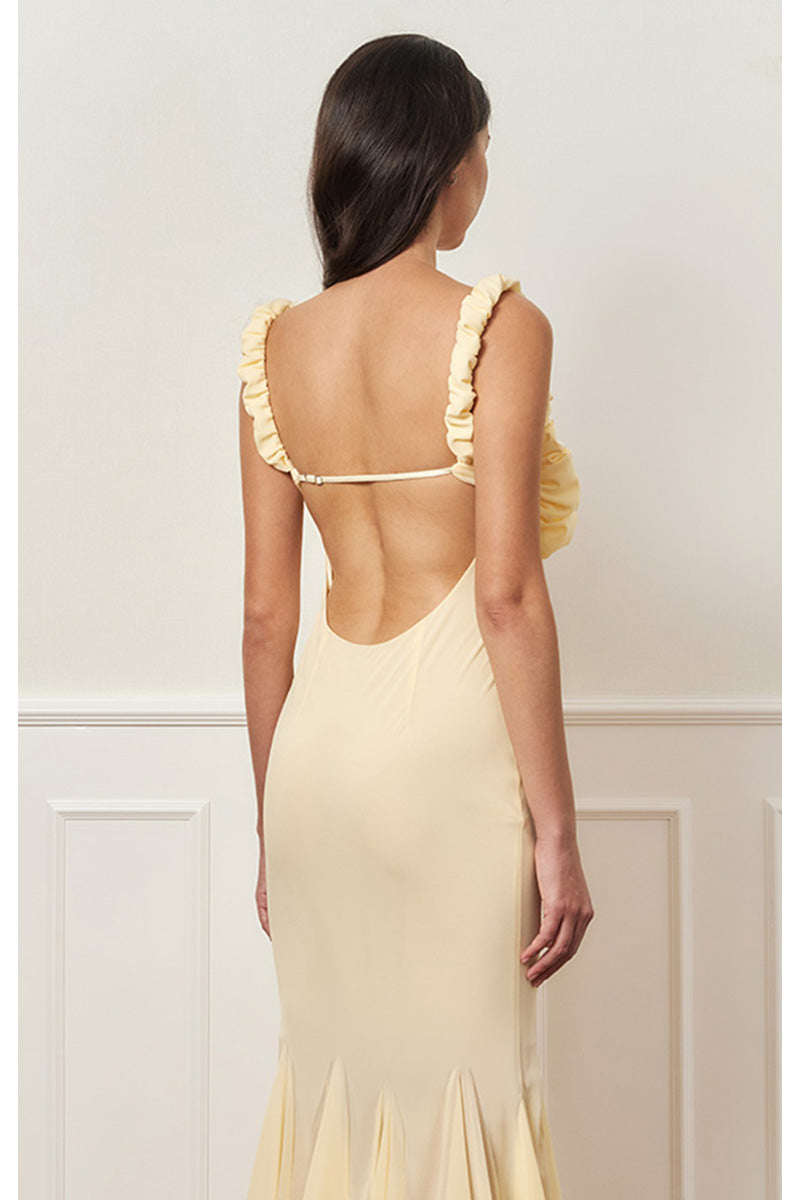 Light yellow Croissant Maxi Slip Dress by Stolen Stores, flowing fabric and relaxed fit for casual summer wear.