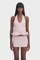 Purple polka dot mini croissant-style top by Stolen Stores, featuring a trendy kapi color and casual fit.