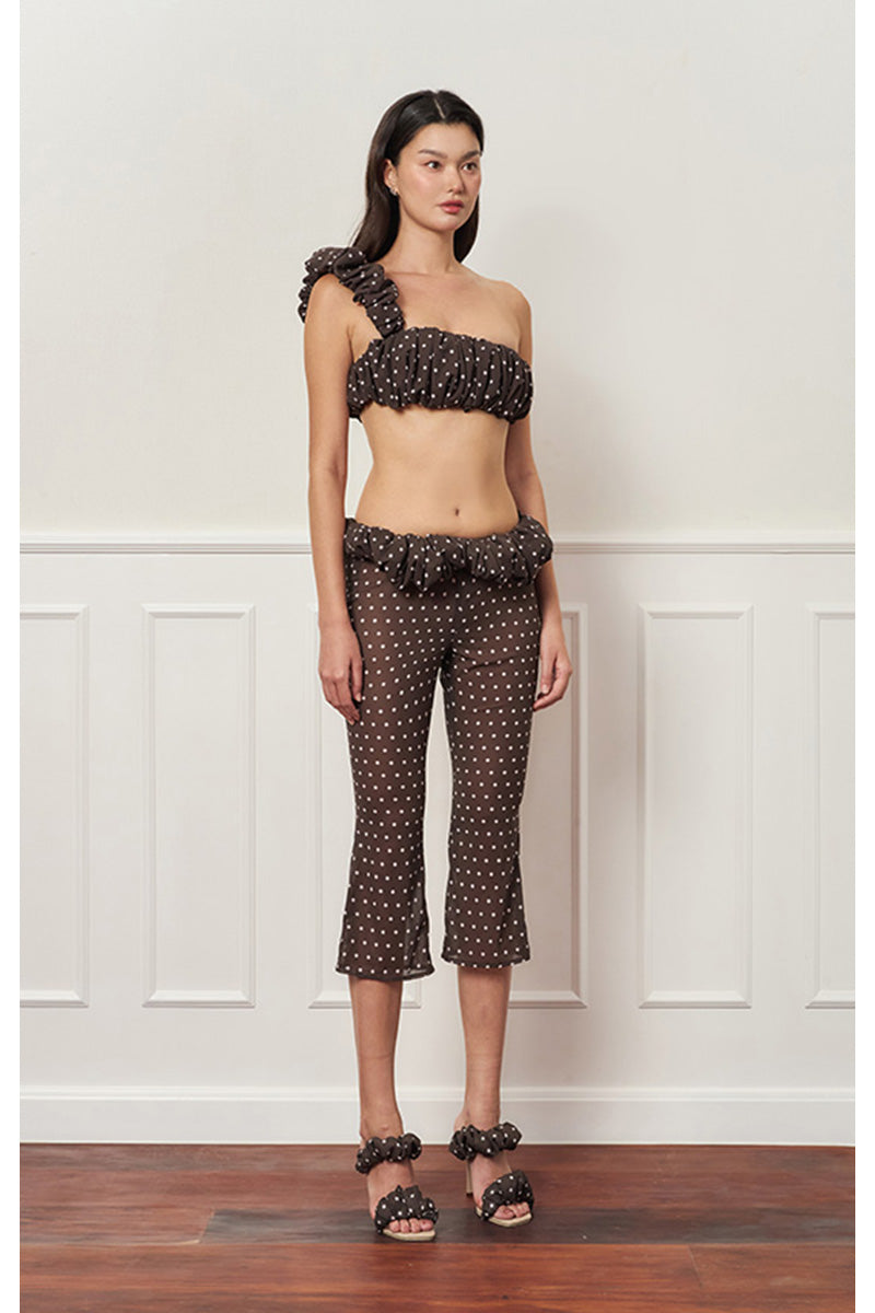 Brown polka dot one-shoulder top from Stolen Stores, featuring a stylish croissant neckline and casual fit.
