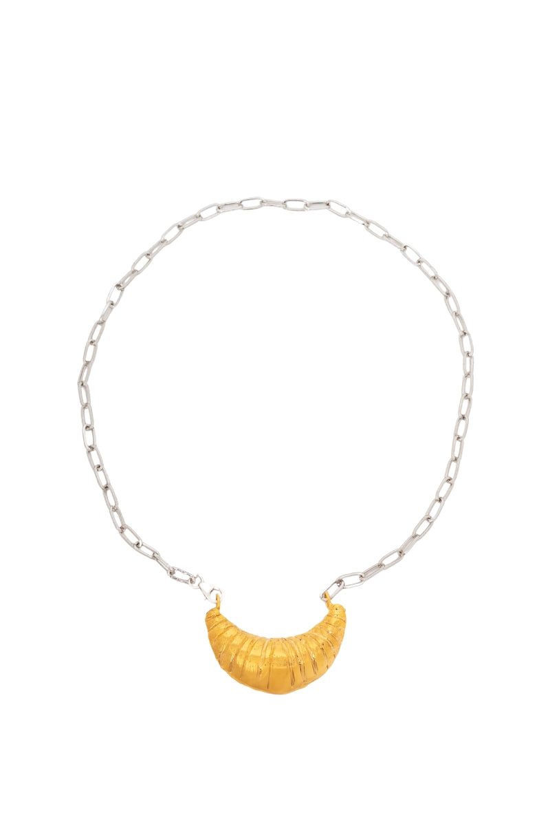 Gold croissant chain necklace by Oz Objects featuring a delicate, French-inspired design with a smooth, shiny finish.