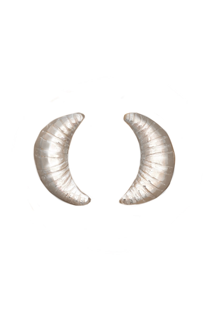 Silver croissant earrings by Oz Objects, featuring detailed crescent-shaped design for a stylish accessory.