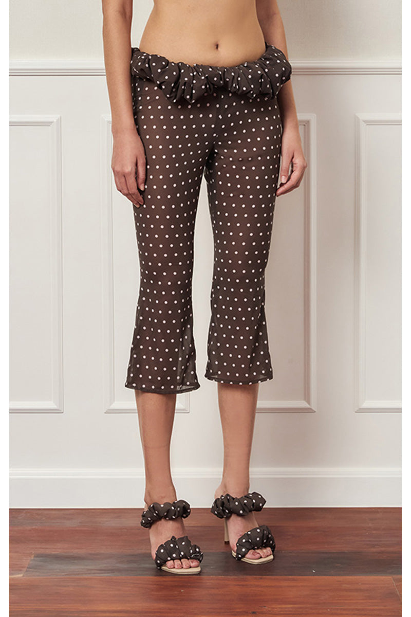 Brown polka dot Croissant Capri pants by Stolen Stores, featuring a stylish, relaxed fit with a playful pattern.