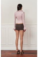 Dusty purple croissant corset shirt by Stolen Stores, featuring a fitted top with unique croissant-inspired design and structured silhouette.