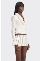 White croissant-shaped corset top by Stolen Stores, featuring a stylish, fitted design with corset detailing and a modern silhouette.