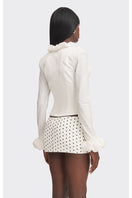 White croissant-shaped corset shirt by Stolen Stores, featuring a fitted design and stylish top in a unique, fashion-forward style.