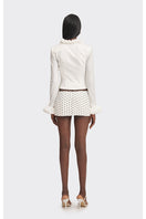 White croissant corset shirt from Stolen Stores, stylish tops featuring a unique croissant-inspired design and fitted silhouette.
