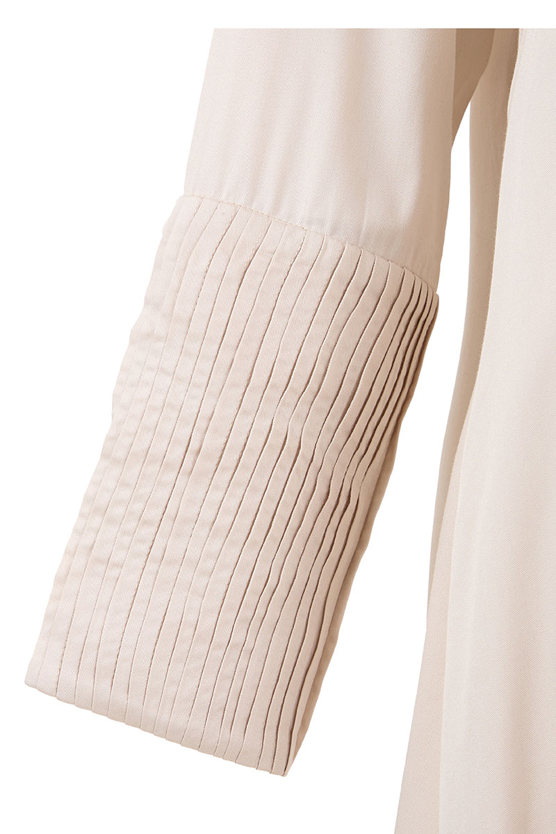 Ivory crossed layer shirt dress by MAZ Manuela Álvarez, featuring a maxi dress design with layered front and relaxed fit.