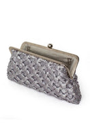 Silver crossed clutch bag by Sarah's Bag featuring a sleek, elegant design with a silver finish and classic style.