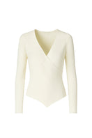 White crossover ribbed top from Bassigue, stylish shirt with a unique crossover design and ribbed fabric detail.