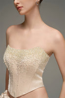 Beige embroidered skirt and corset top co-ord set by I.H.F Studio with crystal embellishments on the corset.