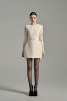 Ivory floral lace long sleeve mini dress by I.H.F Studio with puff sleeves and crystal bow accent, perfect for elegant occasions.