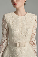 Ivory floral lace long sleeve mini dress by I.H.F Studio featuring puff sleeves and delicate crystal bow accents.