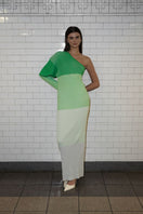 Baobab leaves print maxi dress in pistachio cream, flowing fabric with tiered design, perfect for casual or summer wear.