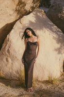 Black Soma maxi dress by Summer Away featuring flowing fabric and elegant design, perfect for summer occasions.