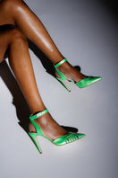 Terry de Havilland Maya heels in vibrant lime color, stylish high-heeled shoes with open toe and ankle strap.