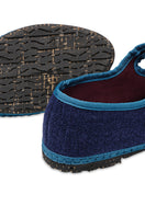 Blue Flabelus Arthur flats shown on a model, featuring a sleek design with a pointed toe and comfortable fit.