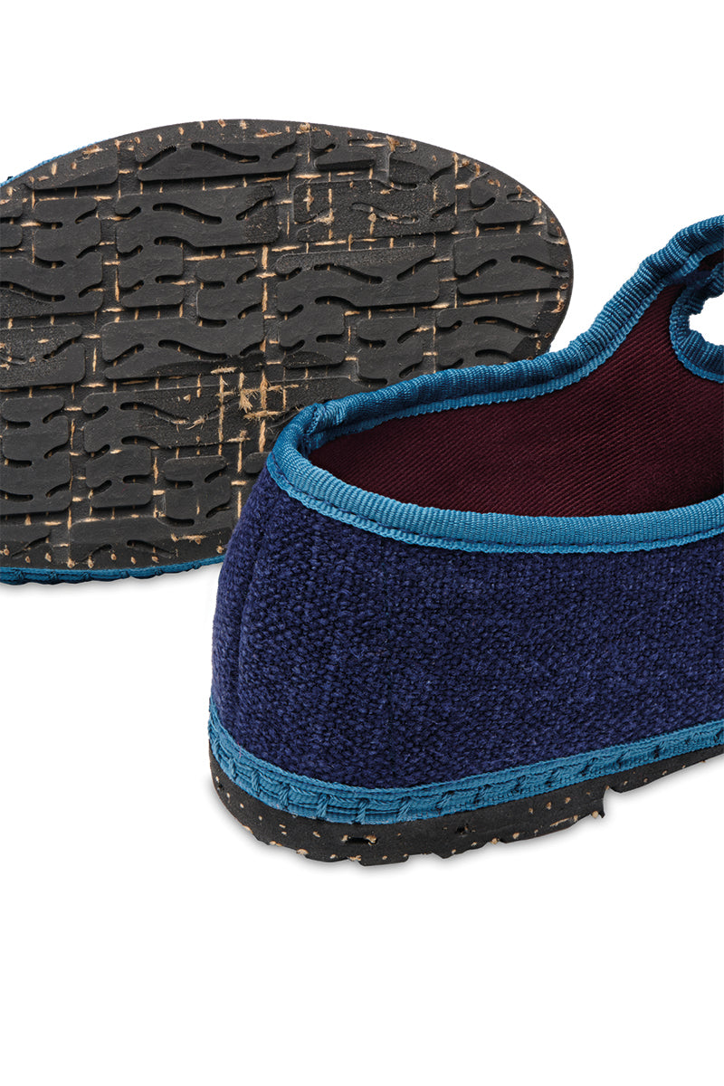 Blue Flabelus Arthur flats shown on a model, featuring a sleek design with a pointed toe and comfortable fit.