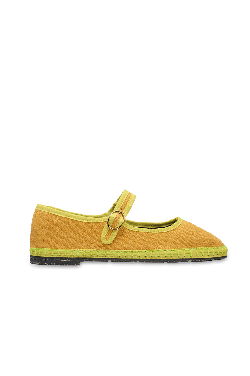 Yellow Flabelus Ebenezer flats showing a sleek, comfortable design with rounded toes and stylish yellow leather finish.