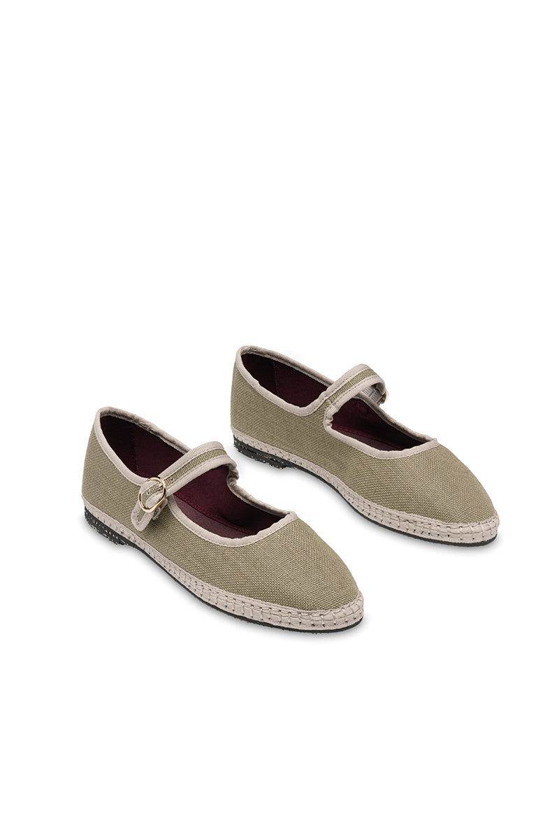 Green Flabelus Ishmael flats with rounded toes and soft fabric upper, styled for casual wear and comfort.