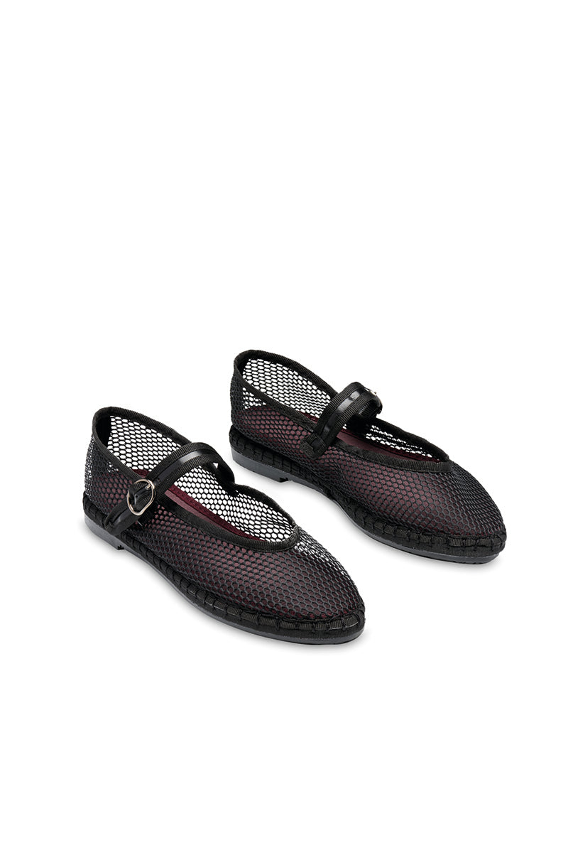 Black Flabelus Isabella flats with sleek design, featuring smooth material and comfortable slip-on style.