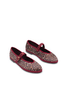 Brown Flabelus Pierre flats shoes with a sleek design, shown on a model's feet.