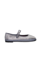 Flabelus Lavinia silver flats showing sleek, pointed toe design with smooth metallic finish and comfortable slip-on style.