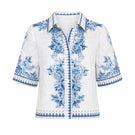 Raishma Ethel shirt, stylish button-up shirt with a tailored fit and detailed design, displayed on a white background.