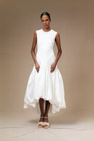 Ivory Cupula Dress by ANA + MARIA, a stylish maxi dress with flowing fabric and elegant design perfect for summer wear.