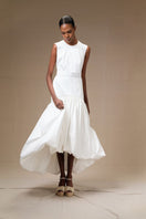 Ivory Cupula Dress by ANA + MARIA, a stylish maxi dress with elegant flowy fabric and a flattering fit.
