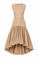 Tan Cupula maxi dress by ANA + MARIA displayed on a mannequin, showcasing flowy fabric and elegant design.