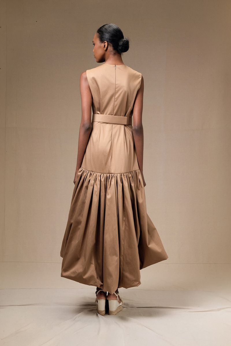 Tan Cupula maxi dress by ANA + MARIA, flowing fabric with a stylish design, perfect for casual or summer wear.