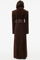 Chocolate brown Kris Marán Curly Maxi Coat displayed on a hanger, showcasing its textured, voluminous curly design and long length.