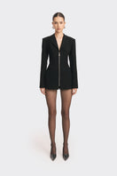 Black open-back suit jacket by Stolen Stores, featuring a sleek design with tailored fit and stylish open back detail.